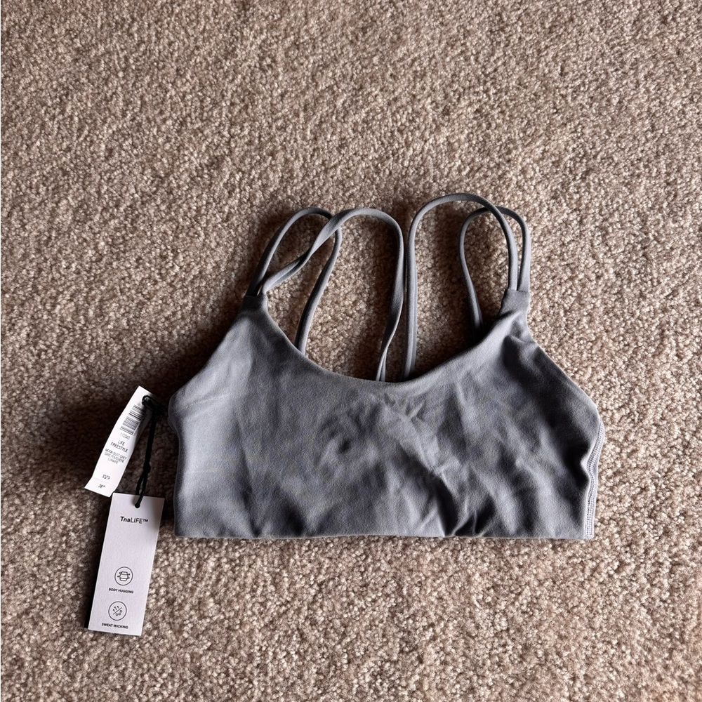 Blue TNA sports bra